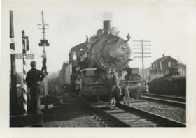 At a railway crossing, [between 1930 and 1949] thumbnail