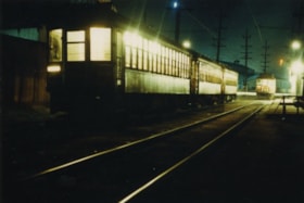 Trams at night, [195-?] thumbnail