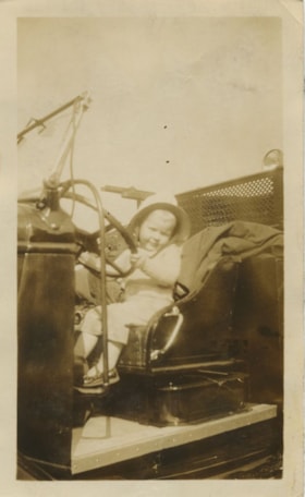 Child in a fire truck, [1930] thumbnail