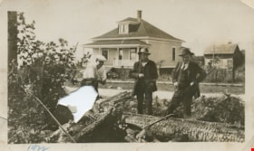 Three men at site of fire, 1922 thumbnail