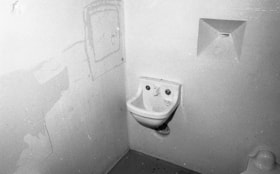 Interior of death row cell with vent and sink, 1991 thumbnail