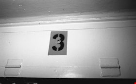 Signage above death row cell number 3, 1991 thumbnail