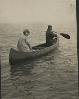 Man and woman in canoe, Aug. 1925 thumbnail