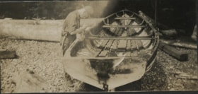 Boy Scout with row boat, Aug. 1925 thumbnail