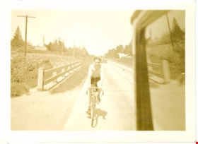 Bicycle rider, June 31, 1936 thumbnail