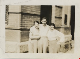 Three people outside building, [1936] thumbnail