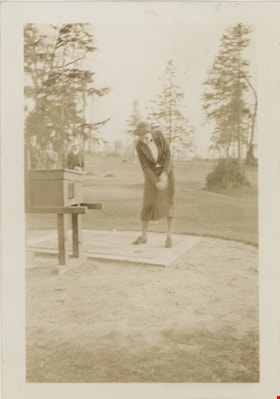 Woman swinging golf club, 18 Apr. 1937 thumbnail
