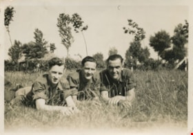 Three soldiers on their stomachs, June 1945 thumbnail