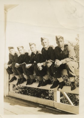 Five soldiers sitting on a fence, [between 1941 and 1945] thumbnail
