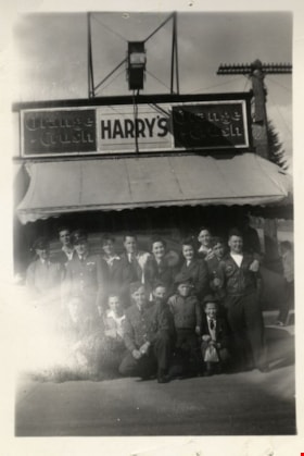Standing in front of Harry's confectionery store, [between 1944 and 1948] thumbnail
