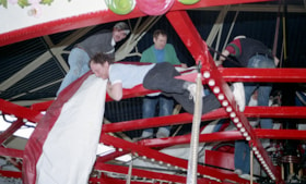 Volunteers installing the cover on the C.W. Parker 119 carousel, [betweeen Feb. 20 and Mar. 26, 1993] thumbnail