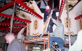 Installing the scenery for the doghouse on the C.W. Parker 119 carousel, [betweeen Feb. 20 and Mar. 26, 1993] thumbnail