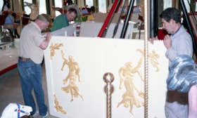 Installing piece of scenery on carousel, [betweeen Feb. 20 and Mar. 26, 1993] thumbnail