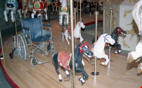 Aluminum ponies and wheelchair on carousel, [betweeen Feb. 20 and Mar. 26, 1993] thumbnail