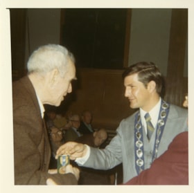 Man receiving pioneer medallion, 9 May 1971 thumbnail