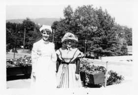 Nurse with pioneer woman, 20 July 1971 thumbnail