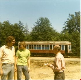Men and tram car on Heritage Village site, 1971 thumbnail
