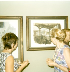 Women with concept drawings of Heritage Village, [August 1971] thumbnail