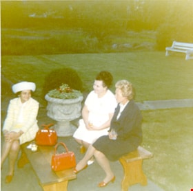 Women seated outside of Elworth house, [August 1971] thumbnail