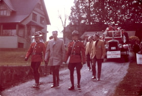 Mayor with R.C.M.P. officers in parade for Heritage Village sod-turning, 11 April 1971 thumbnail