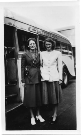 Rhoda Jeffers with woman standing in front of bus, [1952] thumbnail
