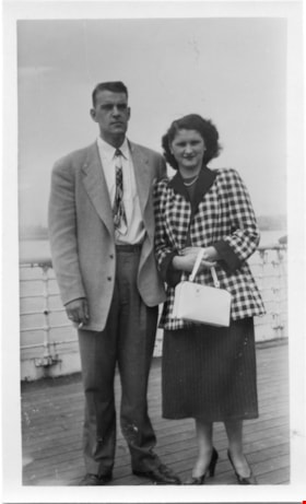 Man and woman standing on boat deck, [1952] thumbnail