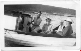 Four women riding in a boat, [193-] thumbnail