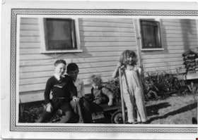 Four children with a wagon, [between 1940 and 1950] thumbnail
