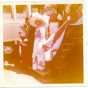 May Bate with a group of men and woman in costumes., 1977 thumbnail