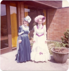 Two women in 1890's costumes., 1970-1980 thumbnail