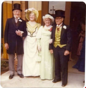 Two men and two women in 1890's costumes., 1970-1980 thumbnail