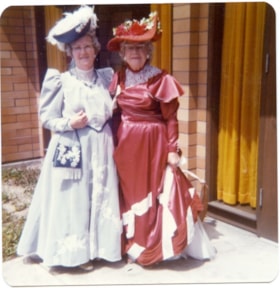 Two women in 1890's costumes., 1970-1980 thumbnail