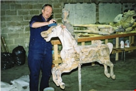 Keith Jamieson sanding carousel horse named  thumbnail
