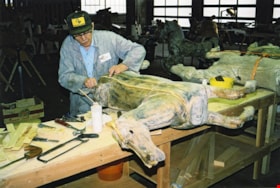 Ed Stebner working on carousel horse undergoing restoration, [between 1990 and 1992] thumbnail