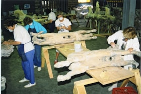 Volunteers working on restoration of carousel horses, [between 1990 and 1992] thumbnail