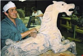 Assistant project manager Barry Blomskog with carousel horse, [between 1990 and 1992] thumbnail
