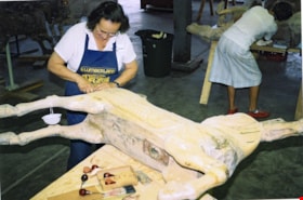 Dorothy Seton Clarke working on carousel horse, [between 1990 and 1992] thumbnail