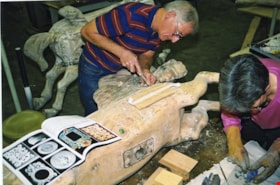Bob Watts and Faye Diamond working on carousel horse, [between 1990 and 1992] thumbnail