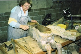 Marie McIlhiney repairing carousel horse, [between 1990 and 1992] thumbnail