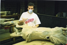 Alan MacAnaulty working on the restoration of a carousel horse, [between 1990 and 1992] thumbnail