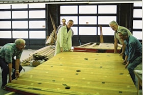 Restoration volunteers working on the platform for the C.W. Parker no. 119 carousel, [between 1990 and 1992] thumbnail