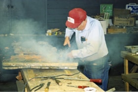 Ed Stebner working on restoration of C.W. Parker no. 119 carousel, [between 1990 and 1992] thumbnail