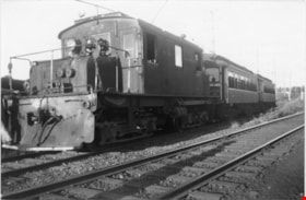 Switch engine pulling two interurban cars, [1940] (date of original), copied [ca. 2000] thumbnail