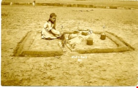 Eileen building sandcastles at White Rock, [1919?] thumbnail