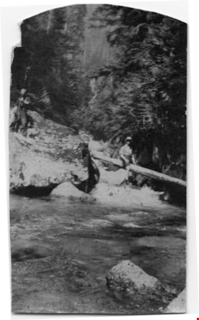 Two men on rocky shore, [ca. 1920] thumbnail