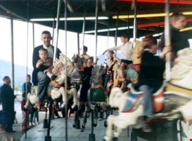 Riders on C.W. Parker Carousel at the PNE, [1960-1969] thumbnail