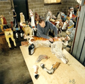 Carousel horse restoration in progress, [between 1989 and 1999] thumbnail
