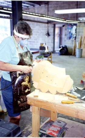 Marie McIlhiney working on carousel horse named Lillie Belle, [between 1989 and 1999] thumbnail
