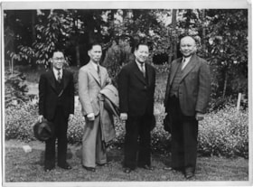 Photograph of four Chinese men., 1975 thumbnail