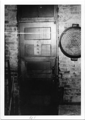 Herbalist kitchen wooden door with round pan, 1975 thumbnail